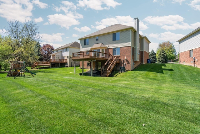 4139 Persimmon Dr, Ypsilanti, MI 48197 - rear view of house featuring stairs, a deck, brick siding, a chimney, and a yard