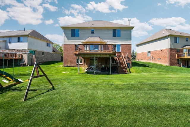4139 Persimmon Dr, Ypsilanti, MI 48197 - back of house with stairway, a wooden deck, brick siding, and a lawn