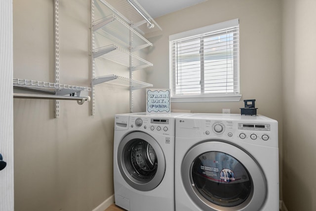 4139 Persimmon Dr, Ypsilanti, MI 48197 - laundry area featuring washing machine and clothes dryer