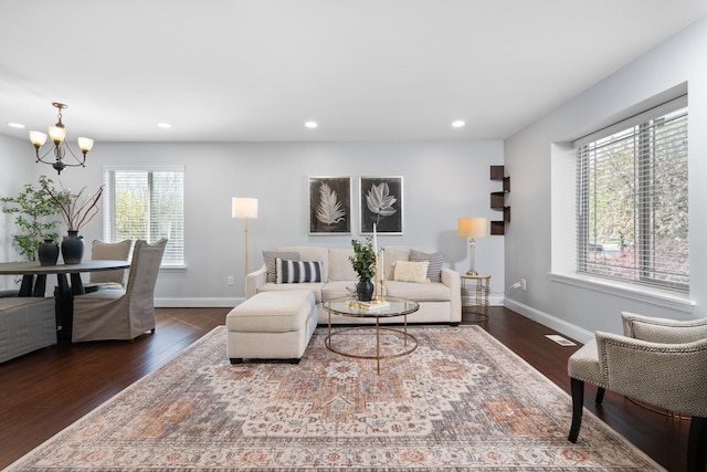 4139 Persimmon Dr, Ypsilanti, MI 48197 - living room featuring baseboards, a chandelier, dark wood finished floors, and recessed lighting