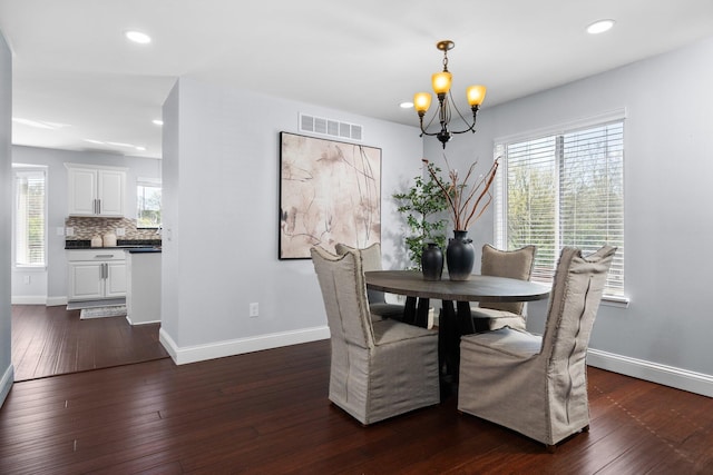 4139 Persimmon Dr, Ypsilanti, MI 48197 - dining room featuring a chandelier, baseboards, healthy amount of natural light, and recessed lighting
