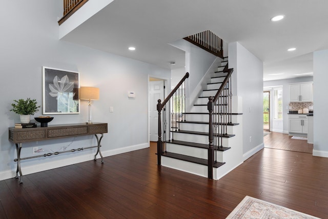 4139 Persimmon Dr, Ypsilanti, MI 48197 - stairway featuring wood-type flooring, recessed lighting, and baseboards