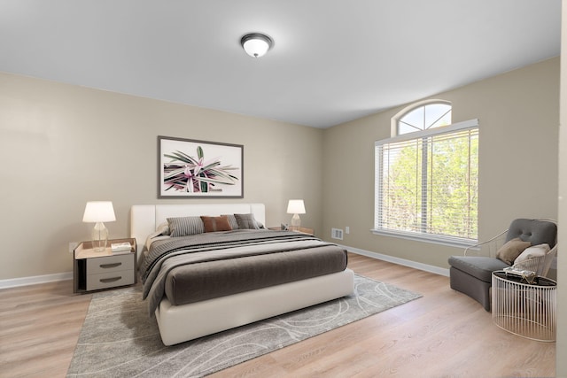 4139 Persimmon Dr, Ypsilanti, MI 48197 - bedroom with light wood-style floors and baseboards