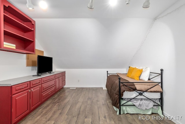 12644 60th Ave, Allendale, MI 49401 - sitting room with wood finished floors, lofted ceiling, and baseboards
