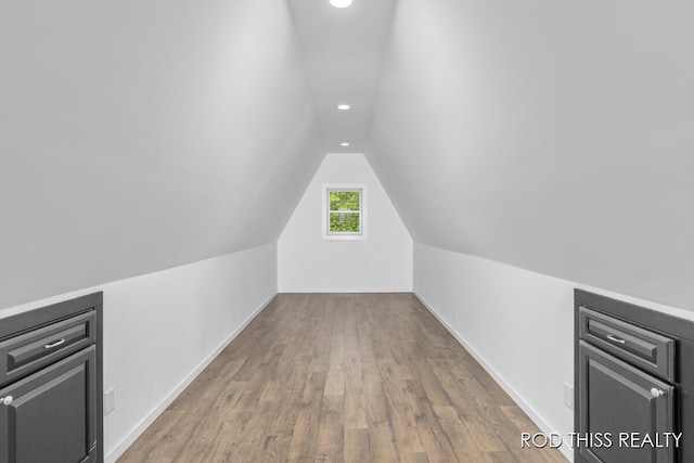 12644 60th Ave, Allendale, MI 49401 - bonus room featuring recessed lighting, lofted ceiling, wood finished floors, and baseboards