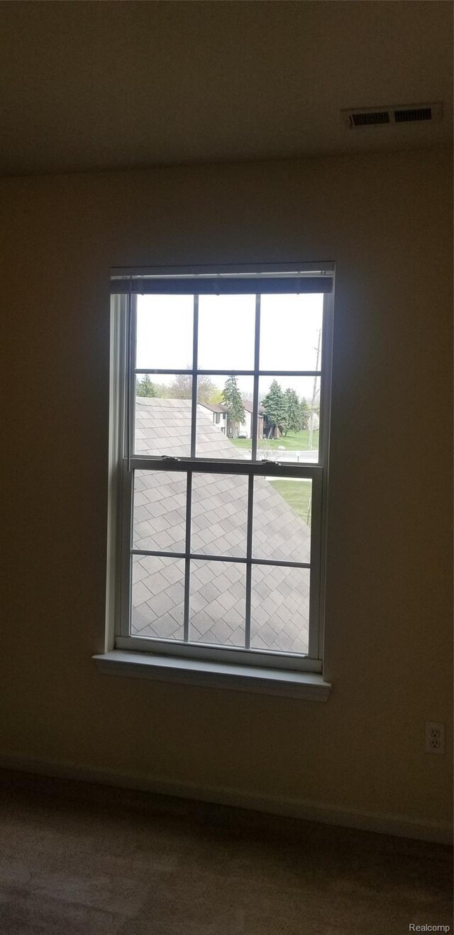 27615 Hidden Oaks Dr Unit 16, Trenton, MI 48183 - unfurnished room with plenty of natural light