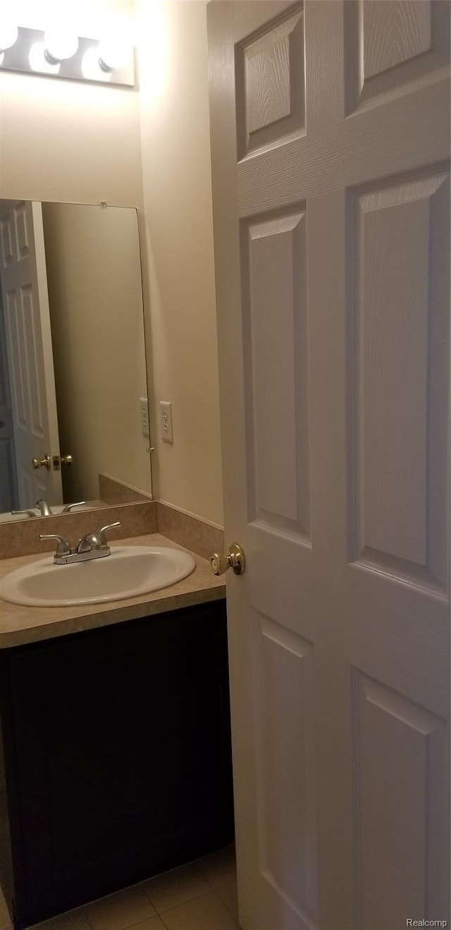 27615 Hidden Oaks Dr Unit 16, Trenton, MI 48183 - bathroom with vanity and tile patterned flooring