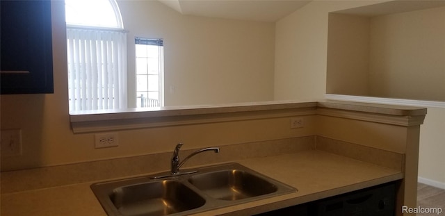 27615 Hidden Oaks Dr Unit 16, Trenton, MI 48183 - kitchen featuring a sink, light countertops, and dishwashing machine