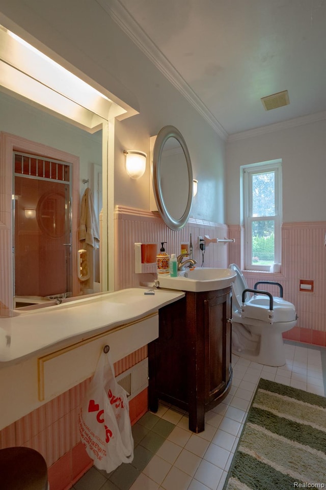 622 Sunningdale Dr, Grosse Pointe Woods, MI 48236 - full bathroom with wainscoting, tile patterned flooring, ornamental molding, vanity, and toilet