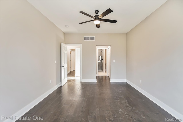 527 Indian Oaks Dr, Howell, MI 48843 - unfurnished room featuring ceiling fan, dark wood-style flooring, and baseboards
