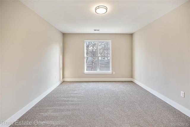 527 Indian Oaks Dr, Howell, MI 48843 - carpeted spare room with baseboards