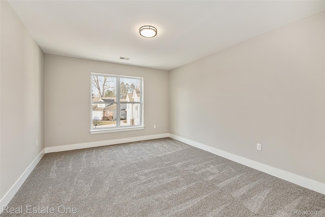 527 Indian Oaks Dr, Howell, MI 48843 - empty room with carpet flooring and baseboards
