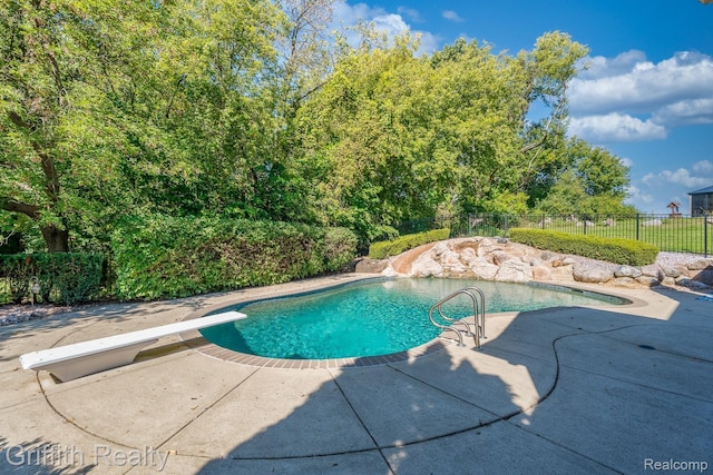 1804 Morgan Lake Ct, Brighton, MI 48114 - view of pool featuring a diving board and a patio