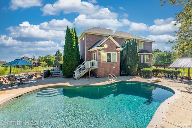 1804 Morgan Lake Ct, Brighton, MI 48114 - view of pool with a patio area and a diving board