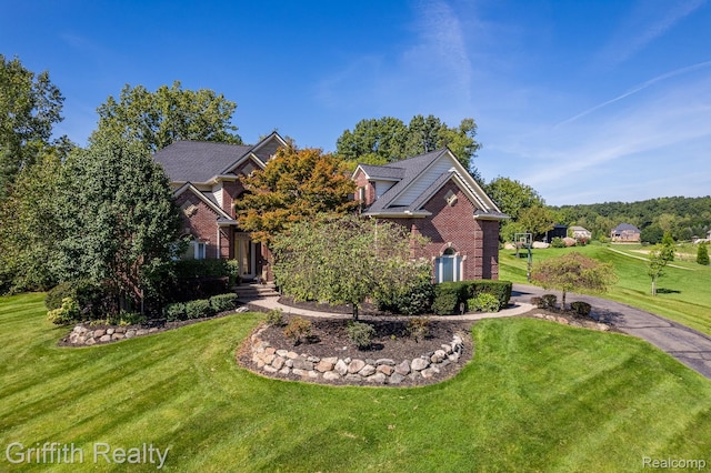 1804 Morgan Lake Ct, Brighton, MI 48114 - view of front of house with brick siding and a front yard