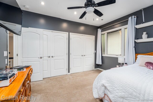 1804 Morgan Lake Ct, Brighton, MI 48114 - bedroom with two closets, light carpet, recessed lighting, and ceiling fan