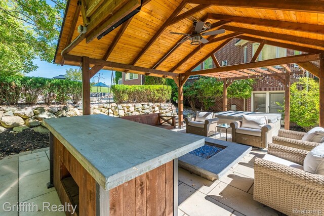 1804 Morgan Lake Ct, Brighton, MI 48114 - view of patio / terrace featuring an outdoor living space with a fire pit, a gazebo, and a ceiling fan