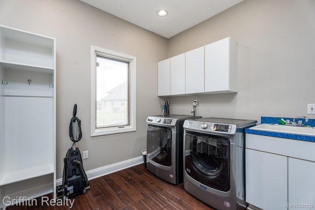 1804 Morgan Lake Ct, Brighton, MI 48114 - laundry room with washer and clothes dryer, dark wood finished floors, cabinet space, baseboards, and recessed lighting