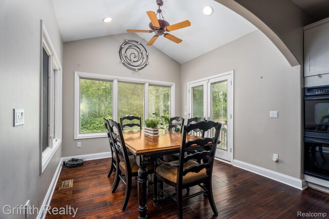 1804 Morgan Lake Ct, Brighton, MI 48114 - dining room featuring arched walkways, a ceiling fan, dark wood-style floors, vaulted ceiling, and baseboards