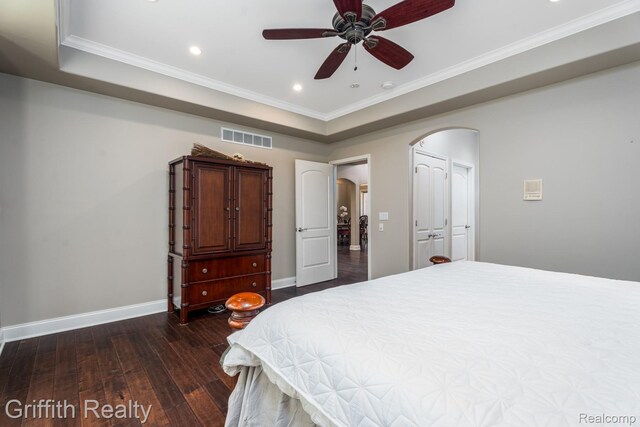 1804 Morgan Lake Ct, Brighton, MI 48114 - bedroom featuring arched walkways, dark wood-type flooring, crown molding, baseboards, and recessed lighting