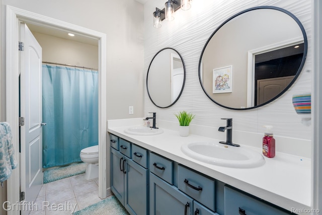 1804 Morgan Lake Ct, Brighton, MI 48114 - bathroom featuring toilet, double vanity, tile patterned floors, and curtained shower