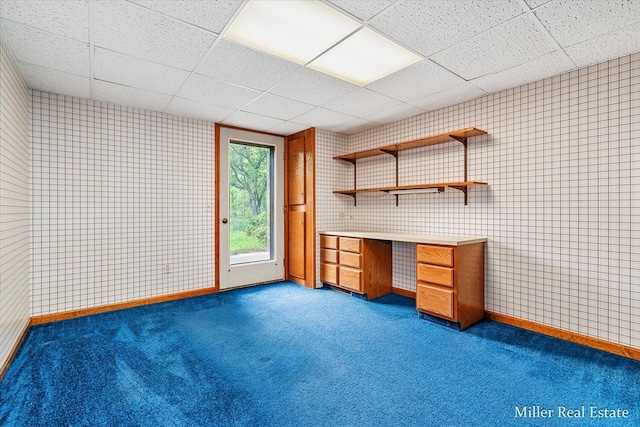 4700 M-79, Nashville, MI 49073 - unfurnished office featuring dark colored carpet, wallpapered walls, baseboards, and a drop ceiling