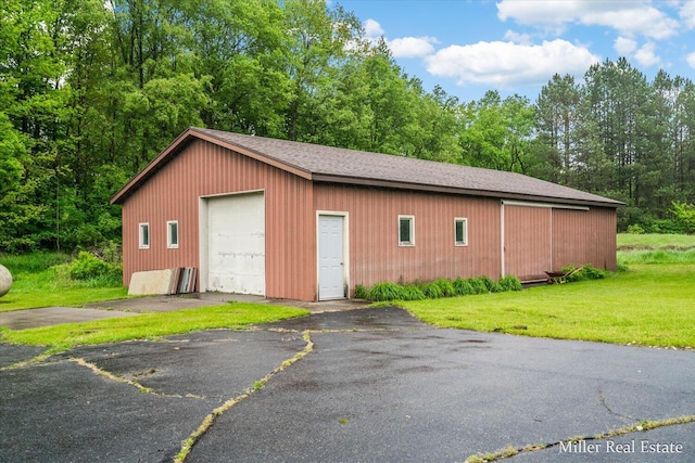 4700 M-79, Nashville, MI 49073 - detached garage with asphalt driveway