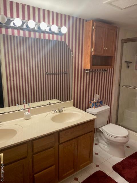 28532 Perryville Way, Farmington Hills, MI 48331 - full bath featuring tile patterned floors, double vanity, walk in shower, and wallpapered walls