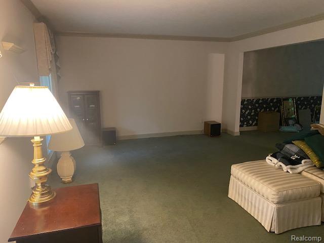 28532 Perryville Way, Farmington Hills, MI 48331 - living area featuring carpet floors and ornamental molding