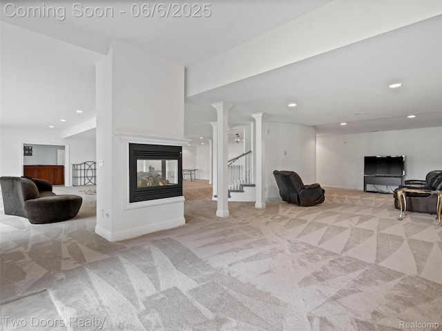 532 Shrewsbury Dr, Clarkston, MI 48348 - carpeted living area featuring a multi sided fireplace, baseboards, recessed lighting, and stairway
