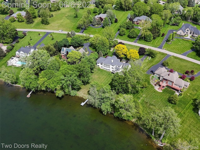 532 Shrewsbury Dr, Clarkston, MI 48348 - aerial overview of property's location featuring a nearby body of water and a tree filled landscape