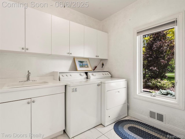 532 Shrewsbury Dr, Clarkston, MI 48348 - laundry room with cabinet space and washer and dryer