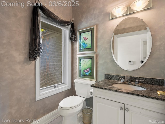 532 Shrewsbury Dr, Clarkston, MI 48348 - bathroom featuring vanity, toilet, and baseboards