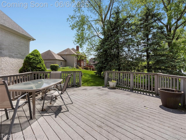 532 Shrewsbury Dr, Clarkston, MI 48348 - wooden deck featuring outdoor dining space and a lawn