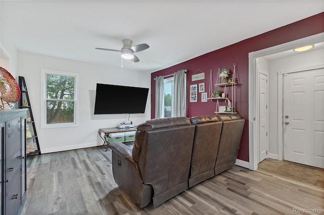 13902 Toepfer Rd, Warren, MI 48089 - living room featuring wood finished floors, a ceiling fan, and baseboards