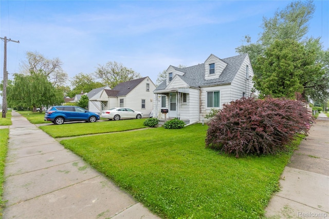 13902 Toepfer Rd, Warren, MI 48089 - view of side of home with a lawn and roof with shingles