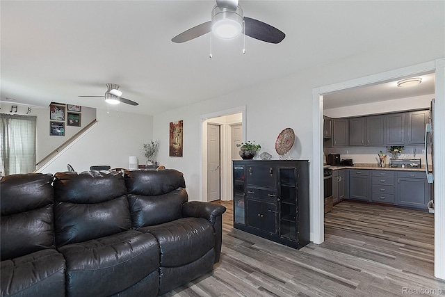 13902 Toepfer Rd, Warren, MI 48089 - living room with ceiling fan and wood finished floors