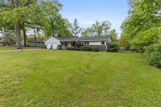 2294 Pinewood St, Jenison, MI 49428 - ranch-style home with a garage, driveway, and a front lawn