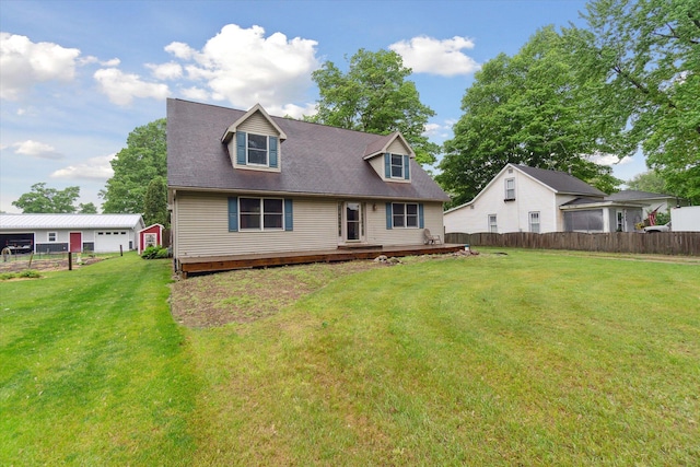 123 N F St, Trufant, MI 49347 - rear view of house with a wooden deck