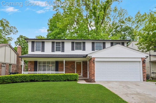 13936 Grove Park Dr, Sterling Heights, MI 48313 - traditional home with a garage, concrete driveway, brick siding, a front yard, and a porch