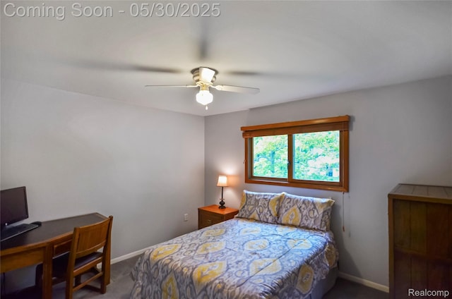 13936 Grove Park Dr, Sterling Heights, MI 48313 - carpeted bedroom featuring baseboards, a ceiling fan, and a desk