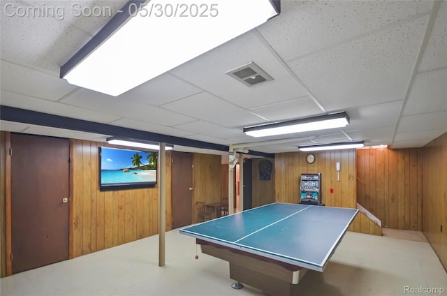13936 Grove Park Dr, Sterling Heights, MI 48313 - game room with wood walls and a drop ceiling