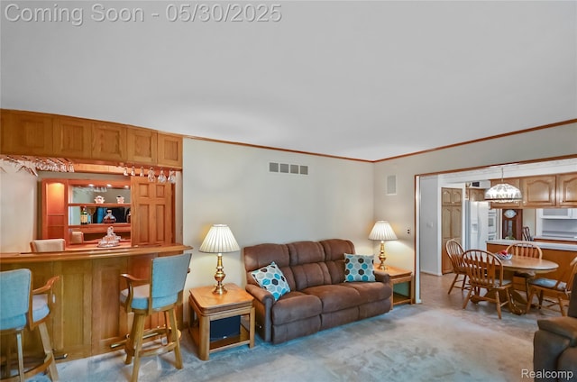 13936 Grove Park Dr, Sterling Heights, MI 48313 - living room featuring carpet flooring, crown molding, and bar area