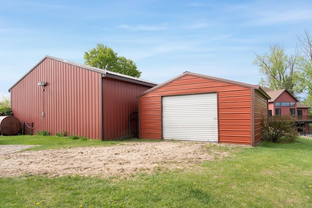 17582 Leroy Rd, Leroy, MI 49655 - detached garage featuring oil tank