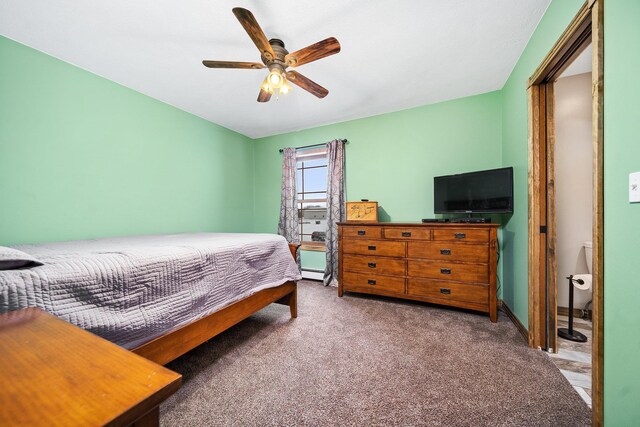 17582 Leroy Rd, Leroy, MI 49655 - carpeted bedroom with a ceiling fan and a baseboard radiator
