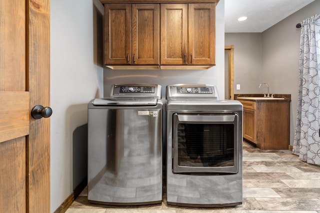 17582 Leroy Rd, Leroy, MI 49655 - washroom featuring washer and clothes dryer, cabinet space, and recessed lighting