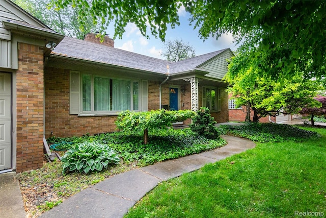 20550 Fairway Ln, Grosse Pointe Woods, MI 48236 - ranch-style house with brick siding, a front yard, and a chimney