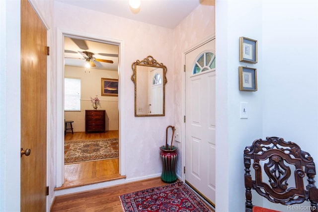 20550 Fairway Ln, Grosse Pointe Woods, MI 48236 - foyer entrance with wood finished floors, ceiling fan, and baseboards