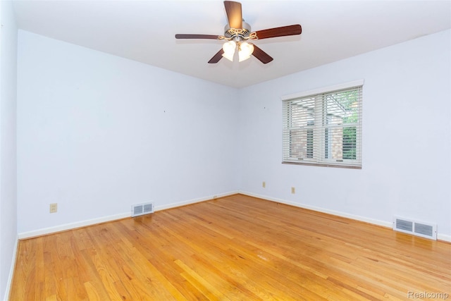 20550 Fairway Ln, Grosse Pointe Woods, MI 48236 - empty room featuring light wood-style flooring, baseboards, and ceiling fan