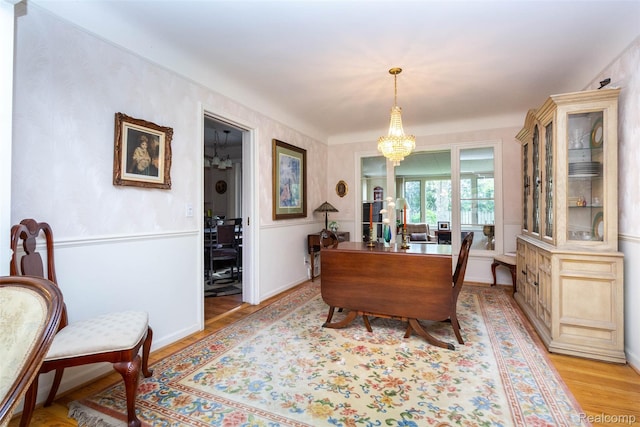 20550 Fairway Ln, Grosse Pointe Woods, MI 48236 - dining room featuring light wood-style floors and a chandelier